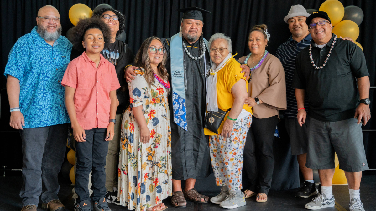 Graduate and family at Pacific Islander celebration Graduate and family at Pacific Islander celebration