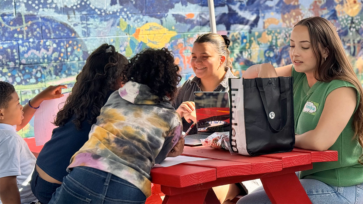 teachers interacting with young learners outside