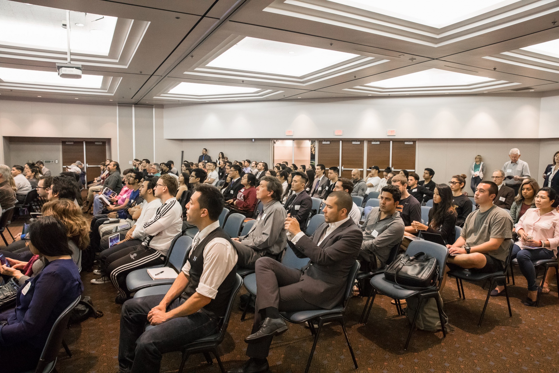 academic audience watching a speaker