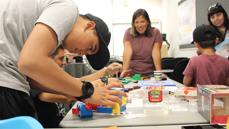 people solving math puzzles
