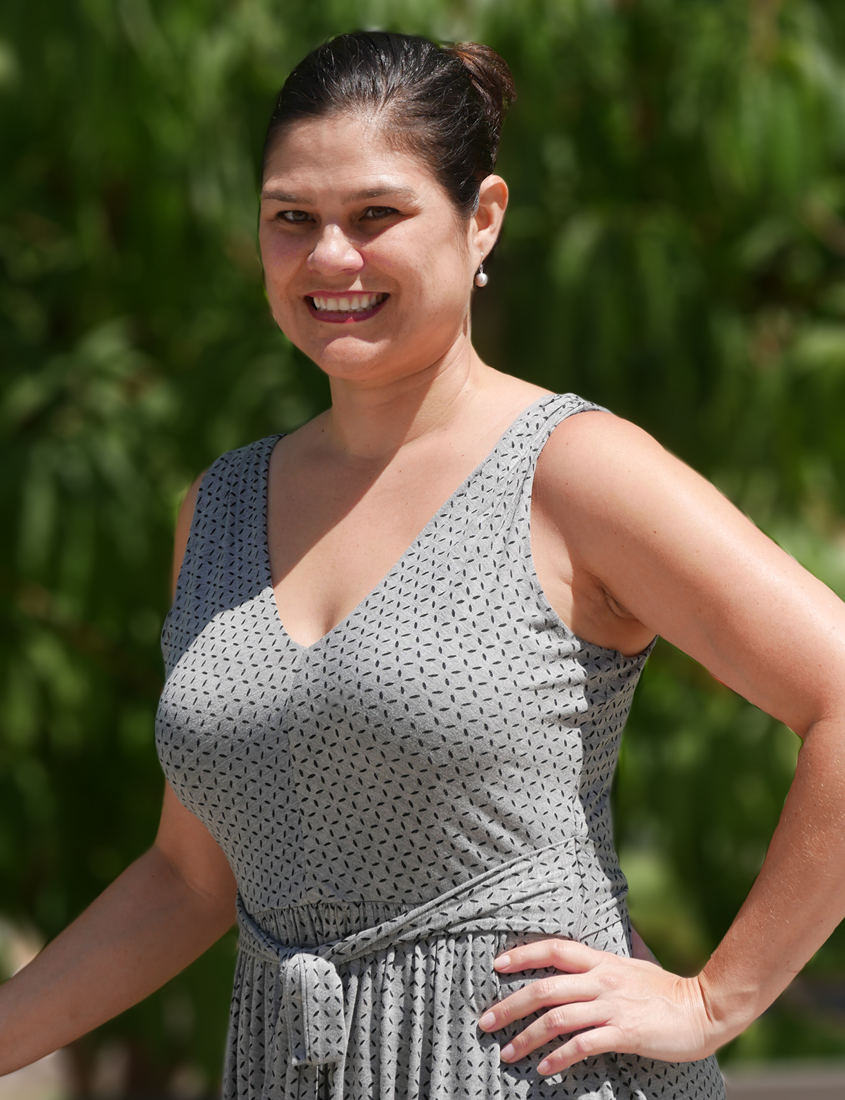 Holly Lopez in front of greenery