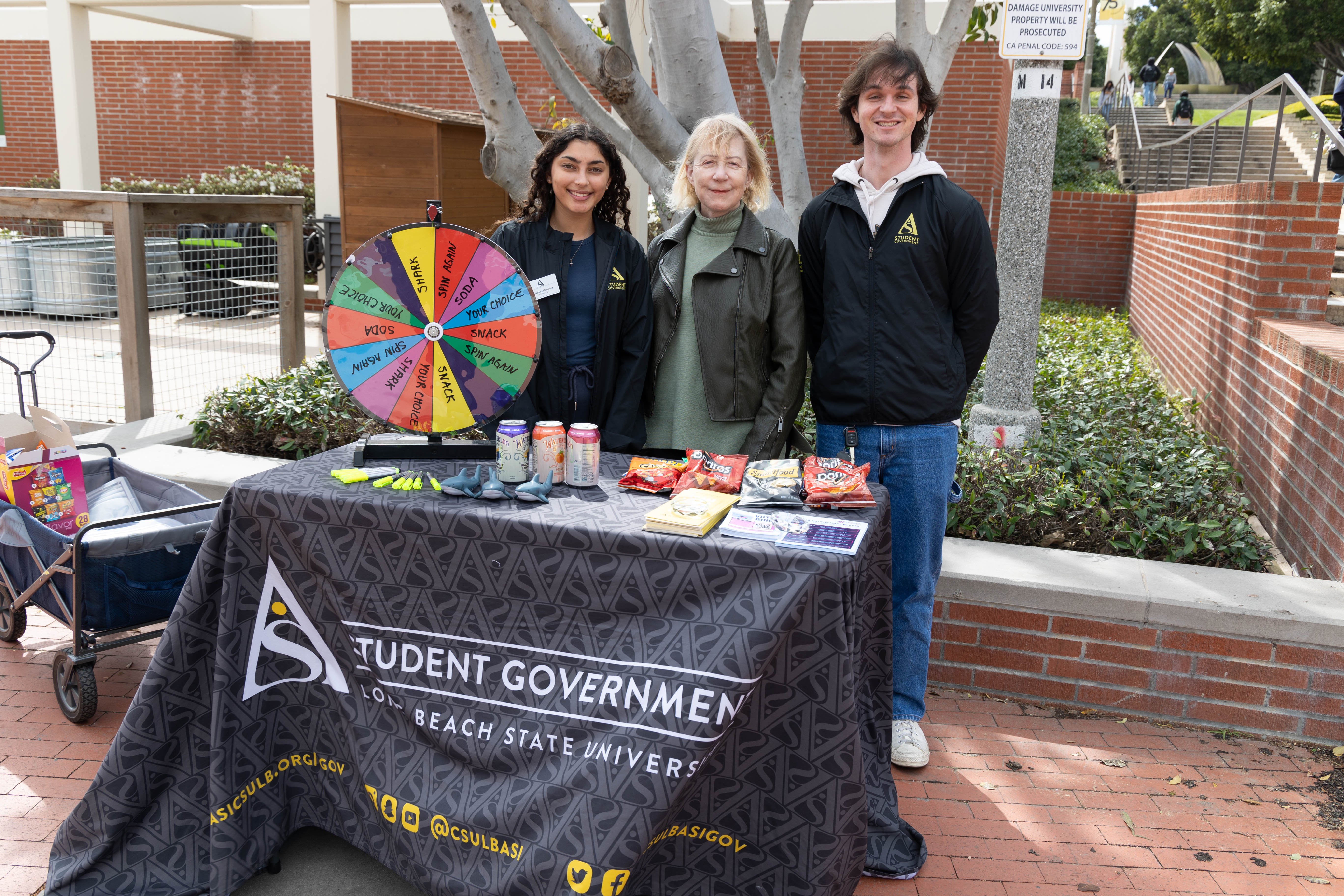 Students behind a table