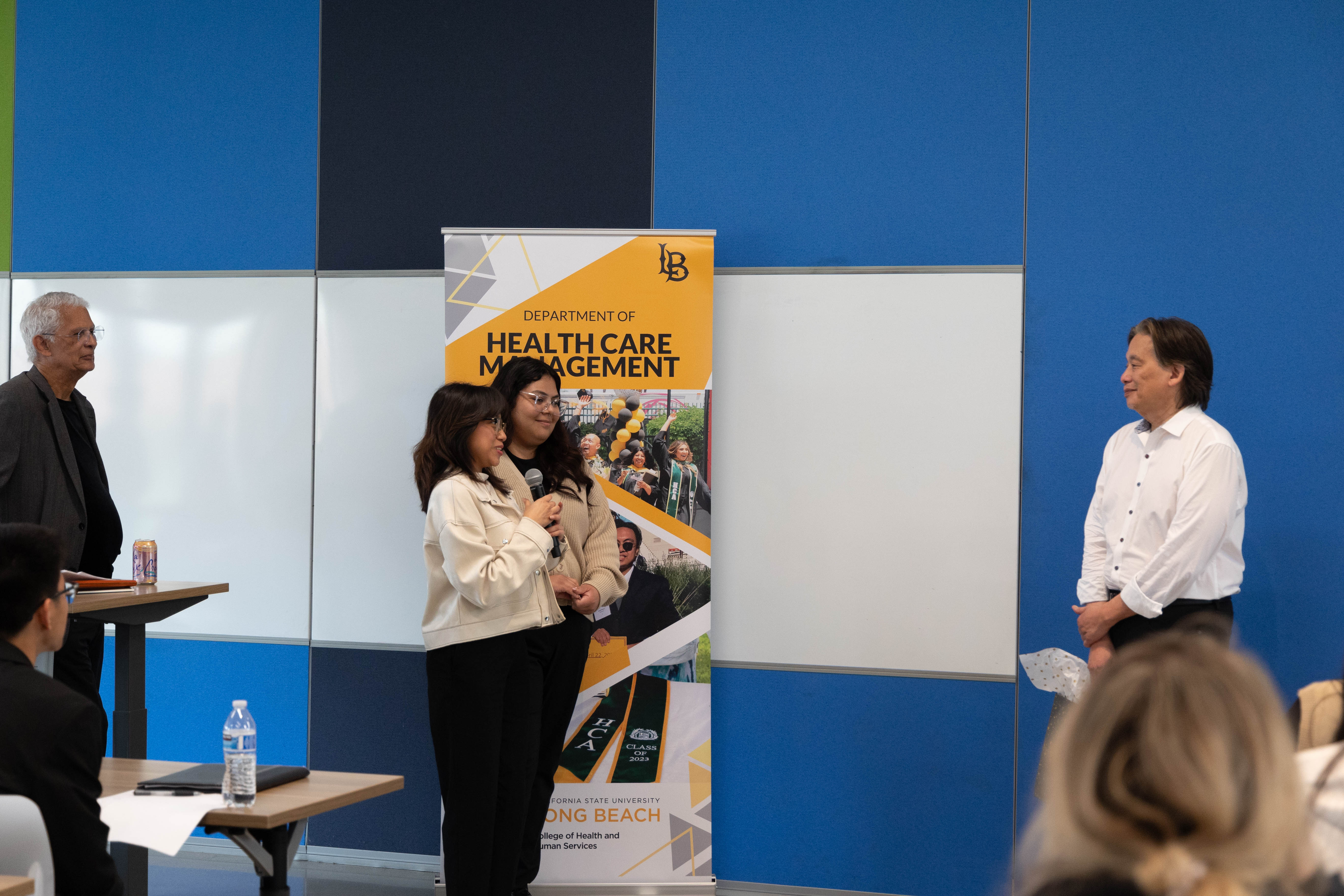 Students present Dr. Anthony Chang with gift