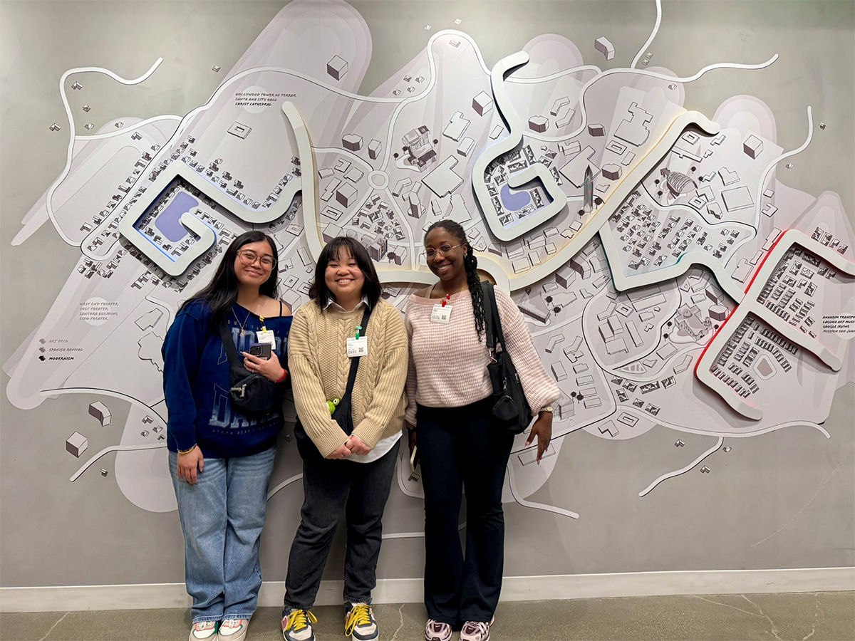 METRIC scholars in front of Google sign