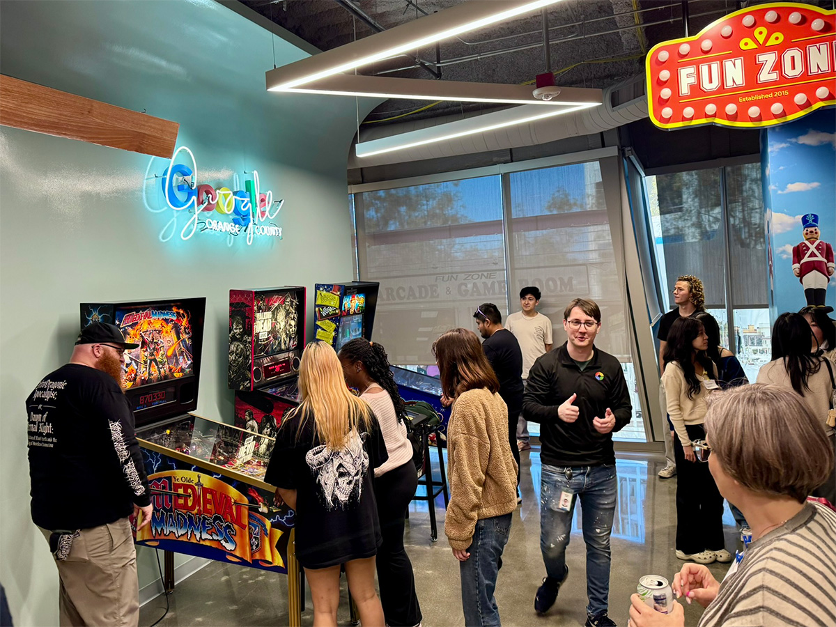 people playing pinball games in a room called the Fun Zone