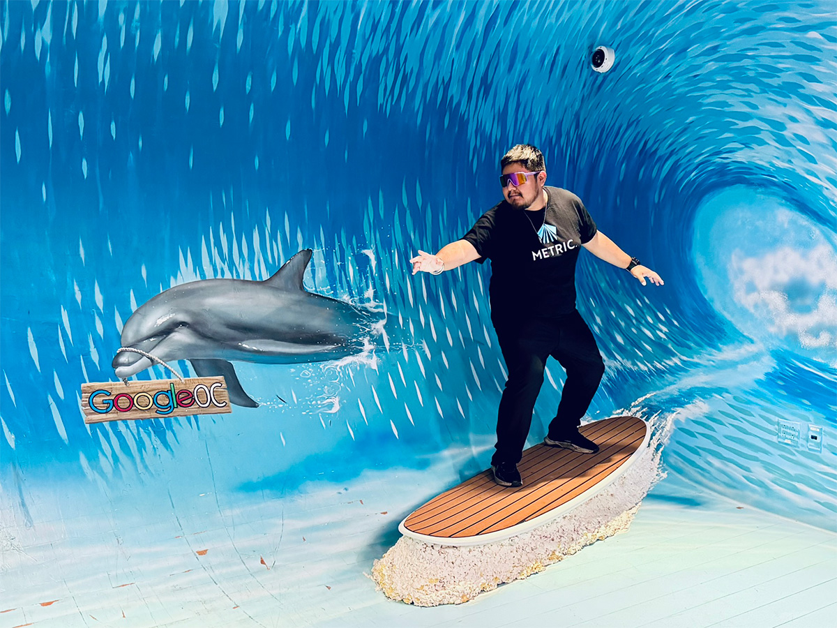 METRIC scholar pretending to surf
