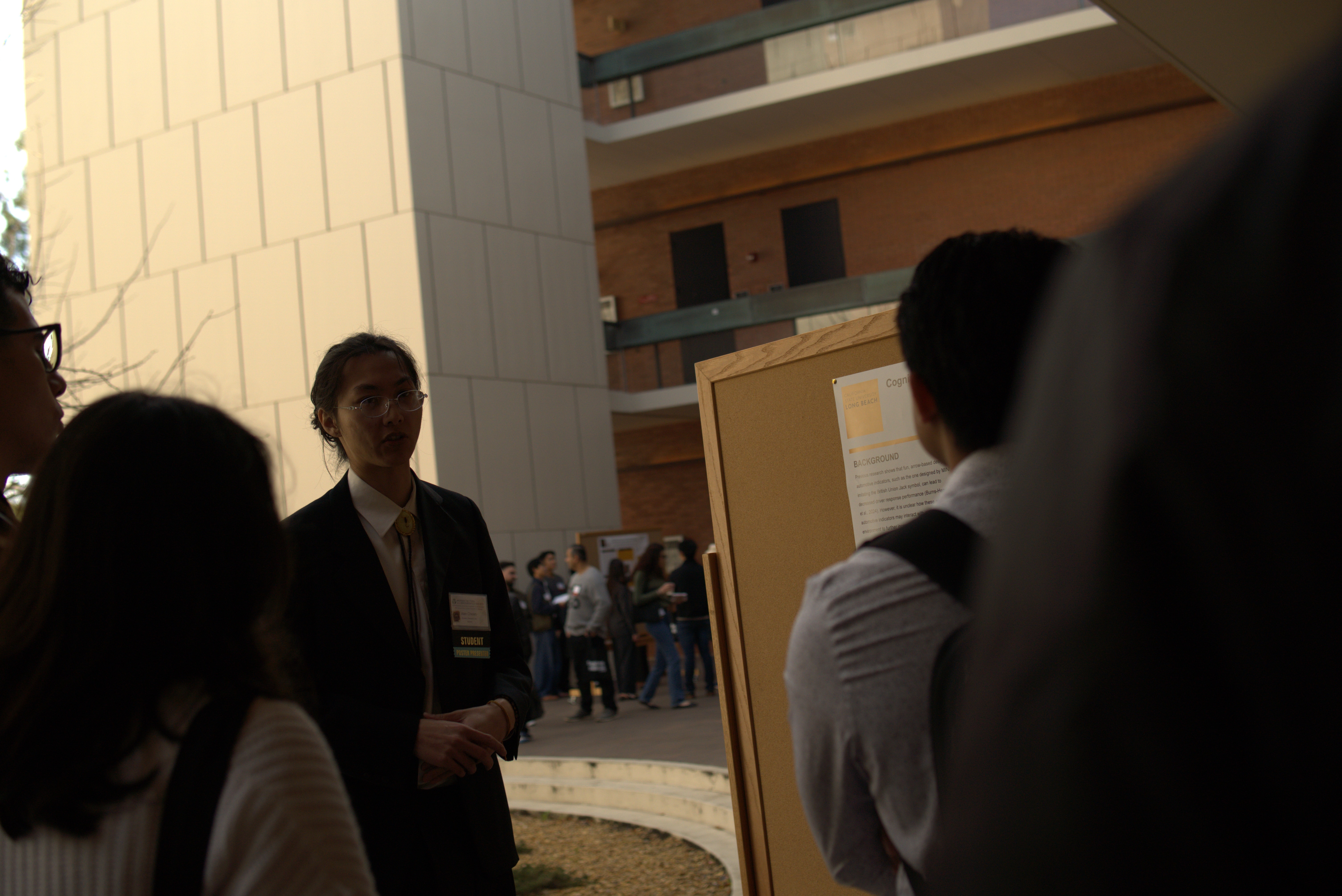 Student presenting during poster session