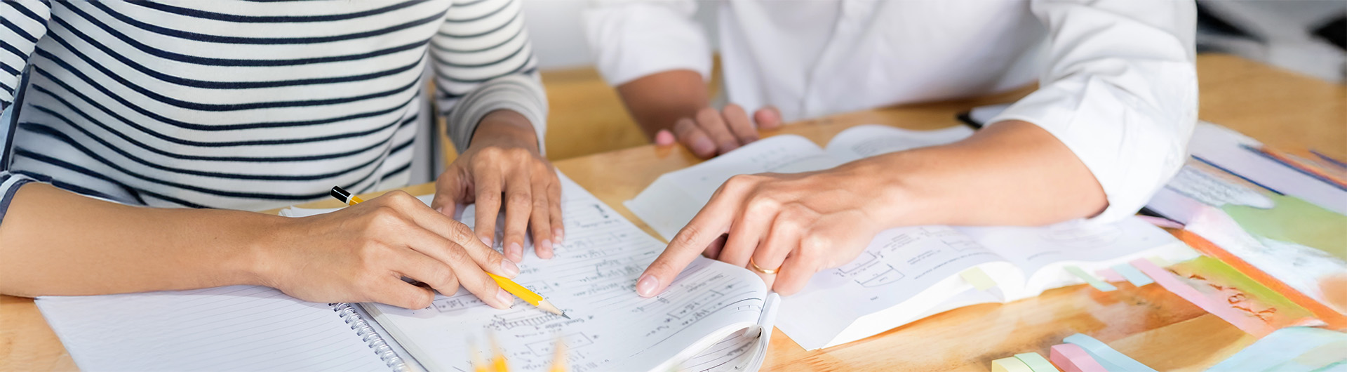 students discussing written notes