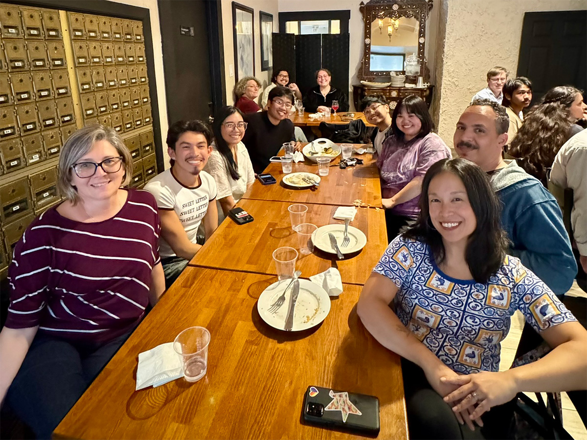 CECS scholars, mentors, and family members at dinner