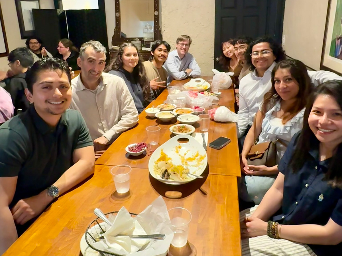 Chemistry and Physics scholars, mentors, and family members at dinner