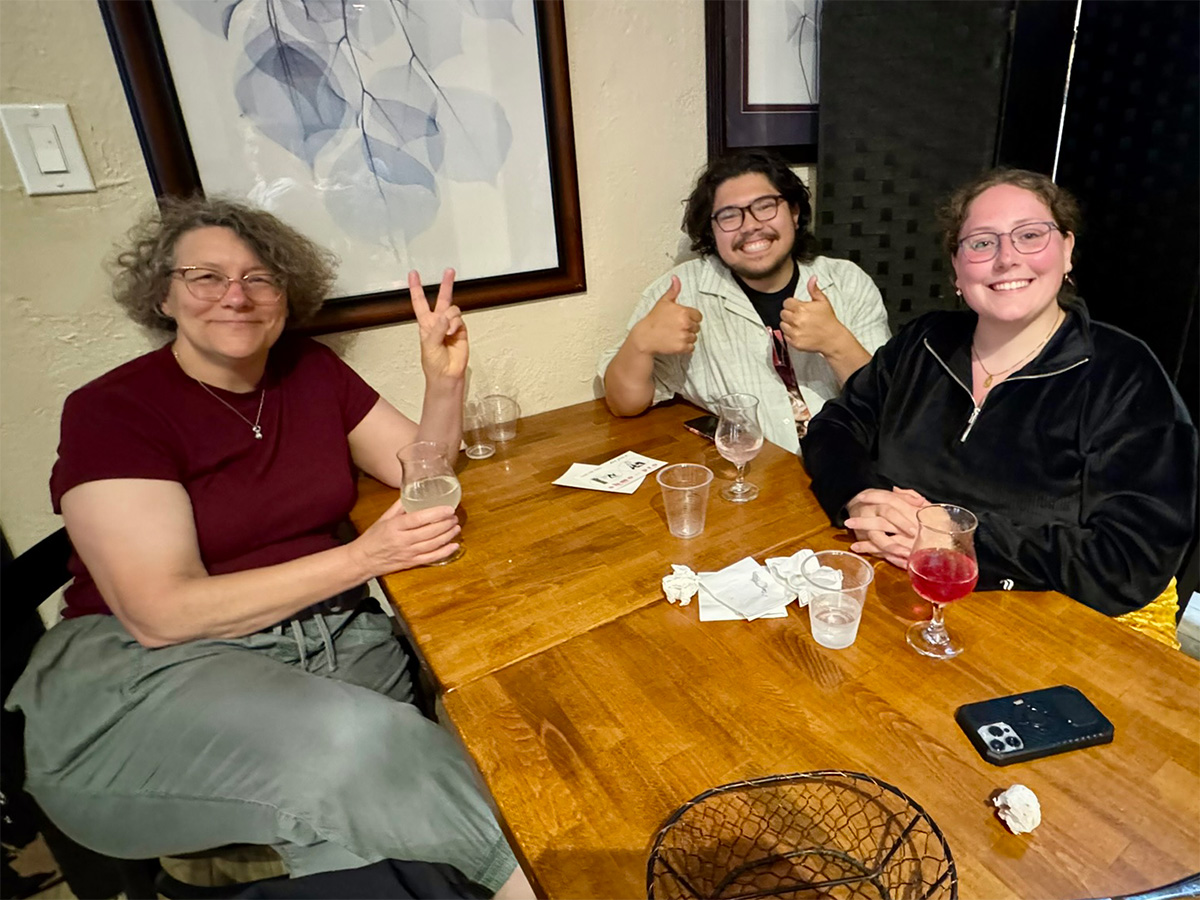 Earth Science scholar and mentor at dinner