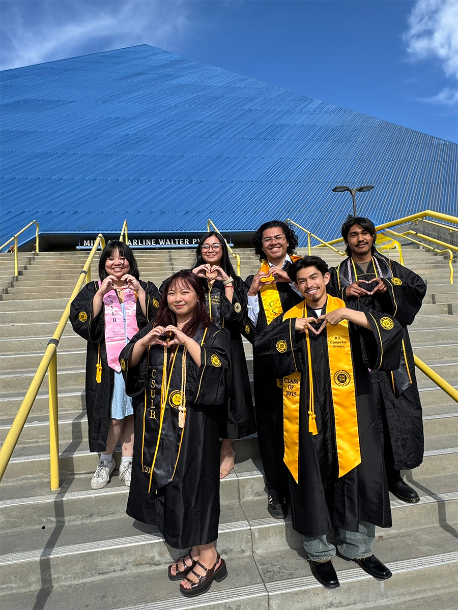 METRICS graduates in front of CSULB Pyramid