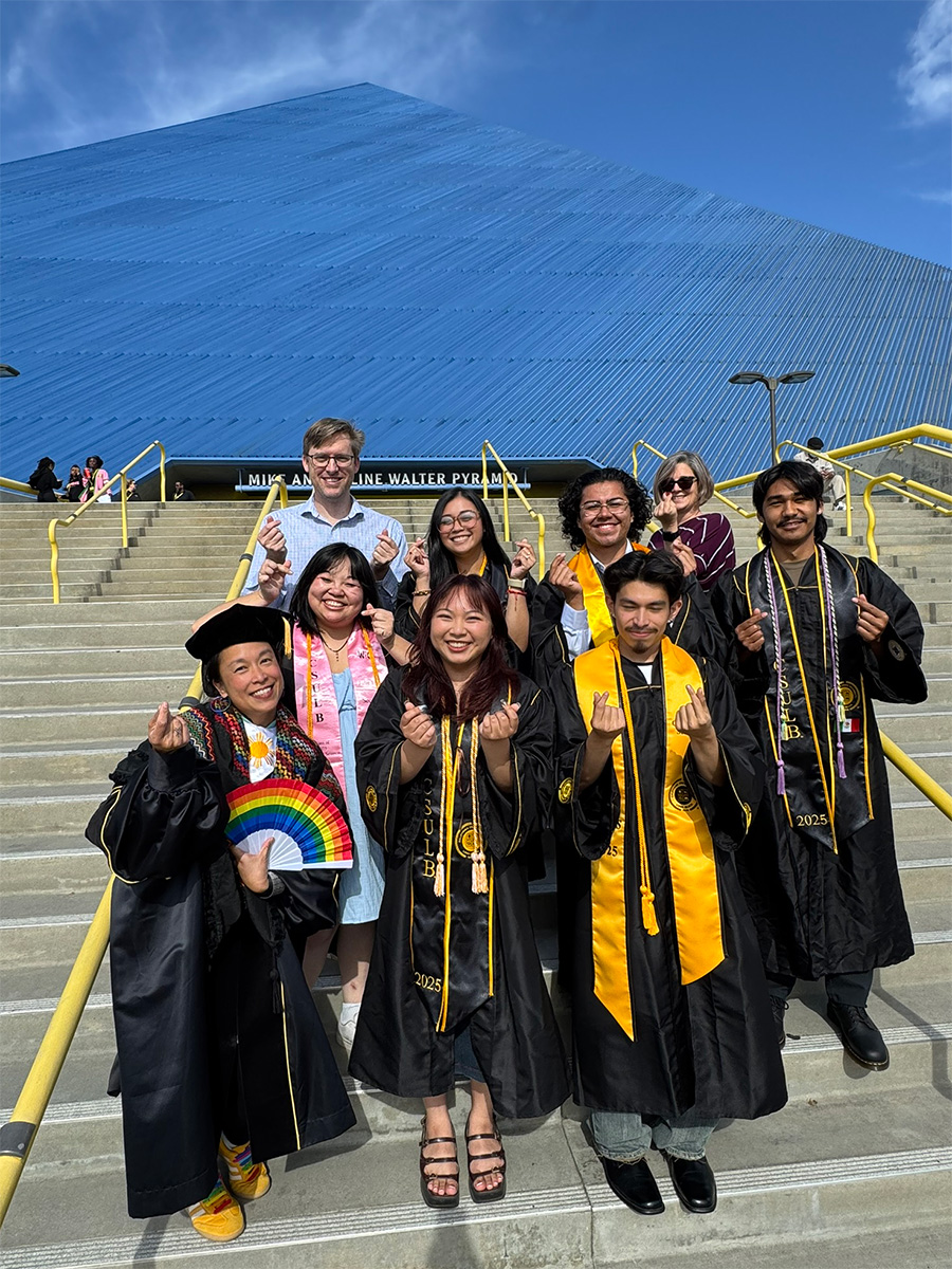 METRIC graduates and mentors in front of CSULB pyramid