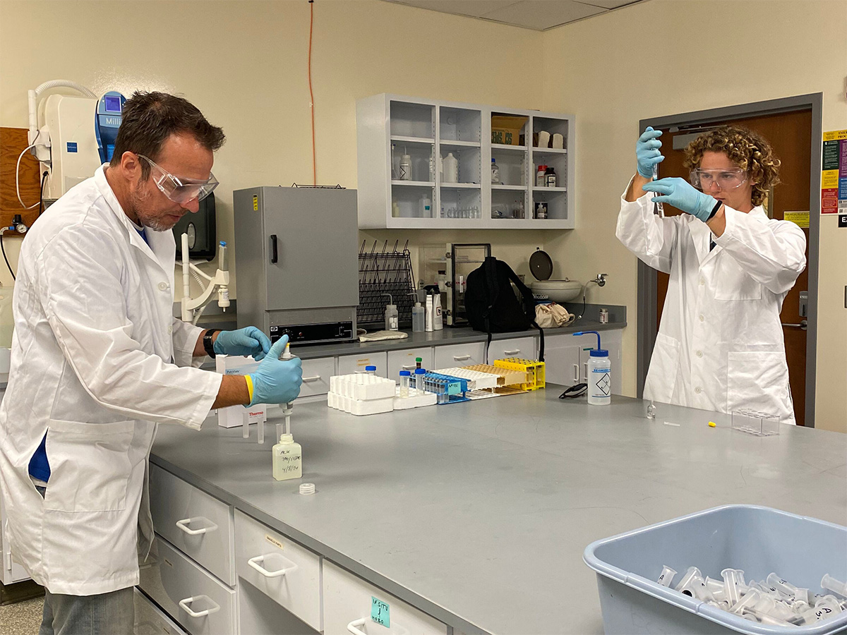 Dr. Hagedorn and Gavin in the lab