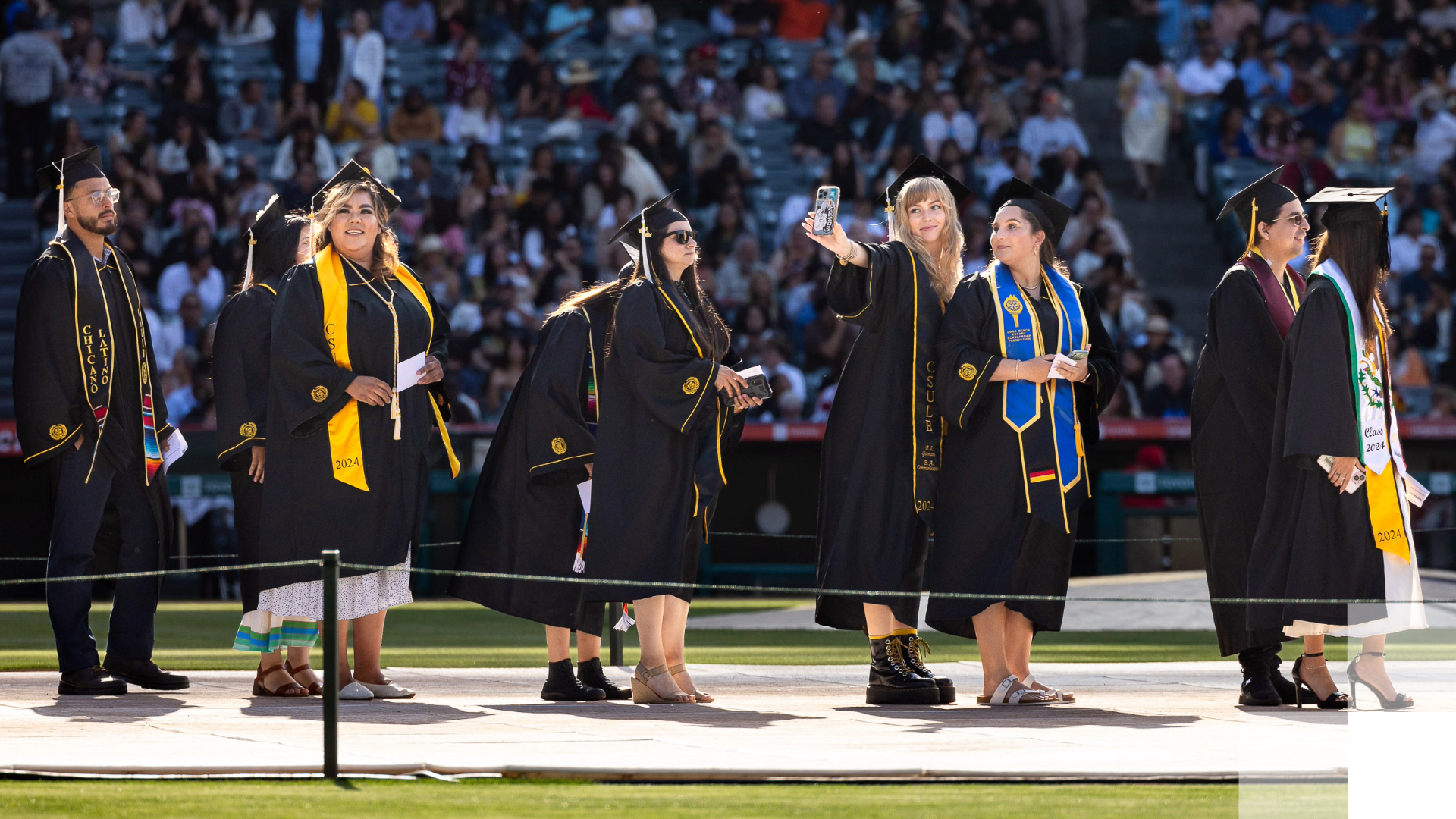 Graduating Students Students walking in a line to graduate