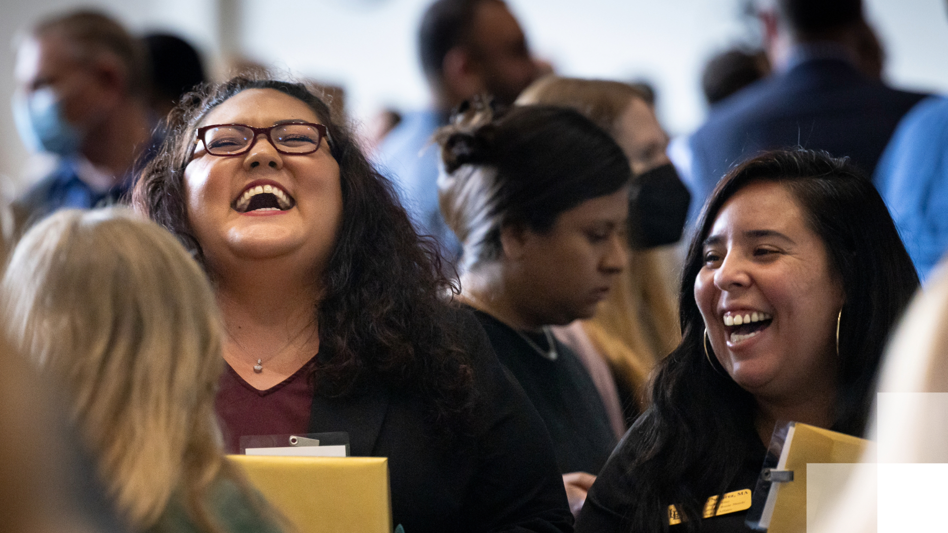 Reimagine Staff People laughing together