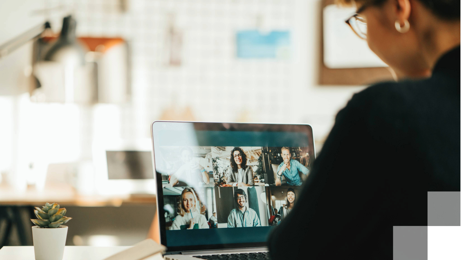 Supporting annual growth in health and human services Person on a video call with six people displayed on a laptop screen