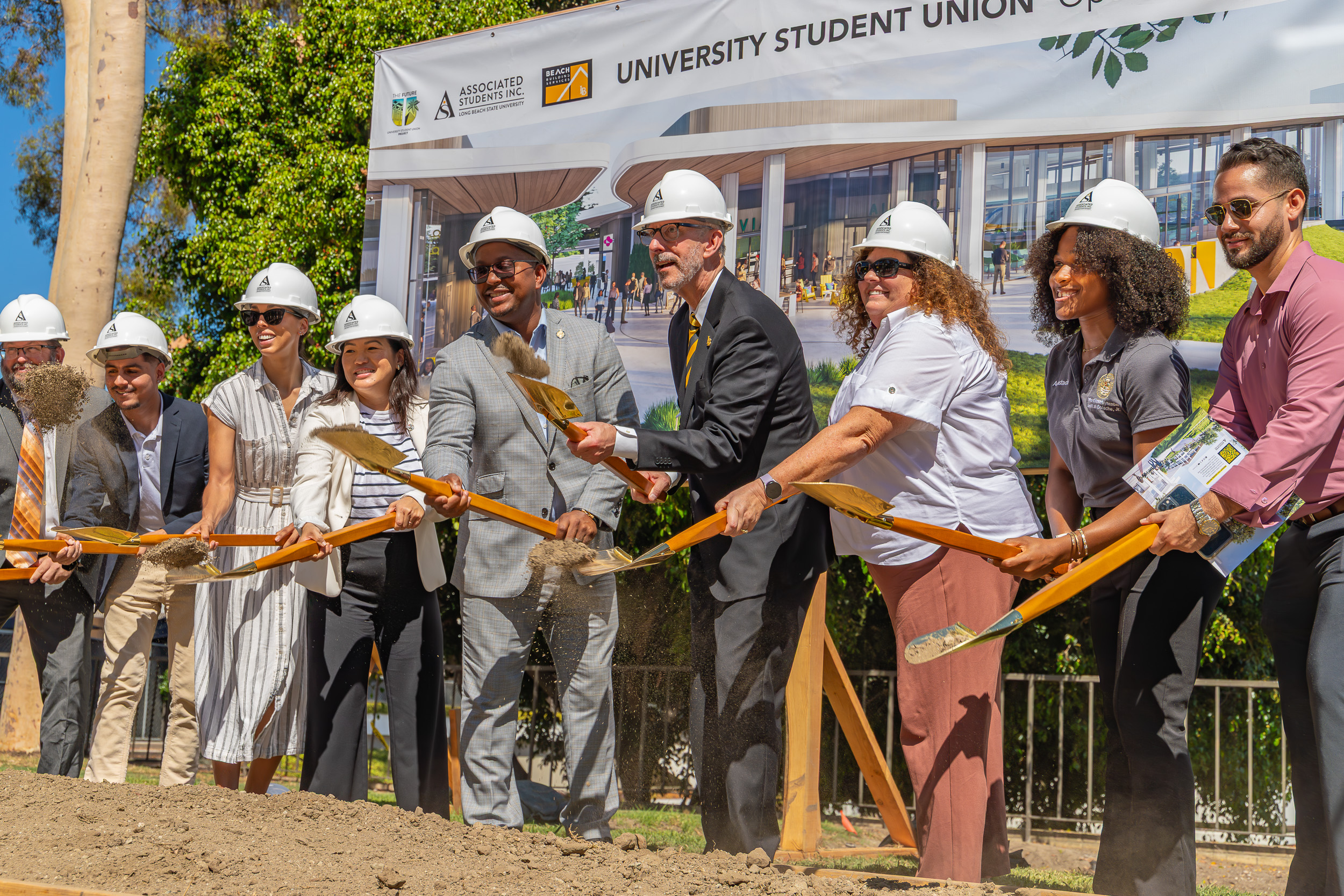 Dignitaries shovel dirt at Future U groundbreaking