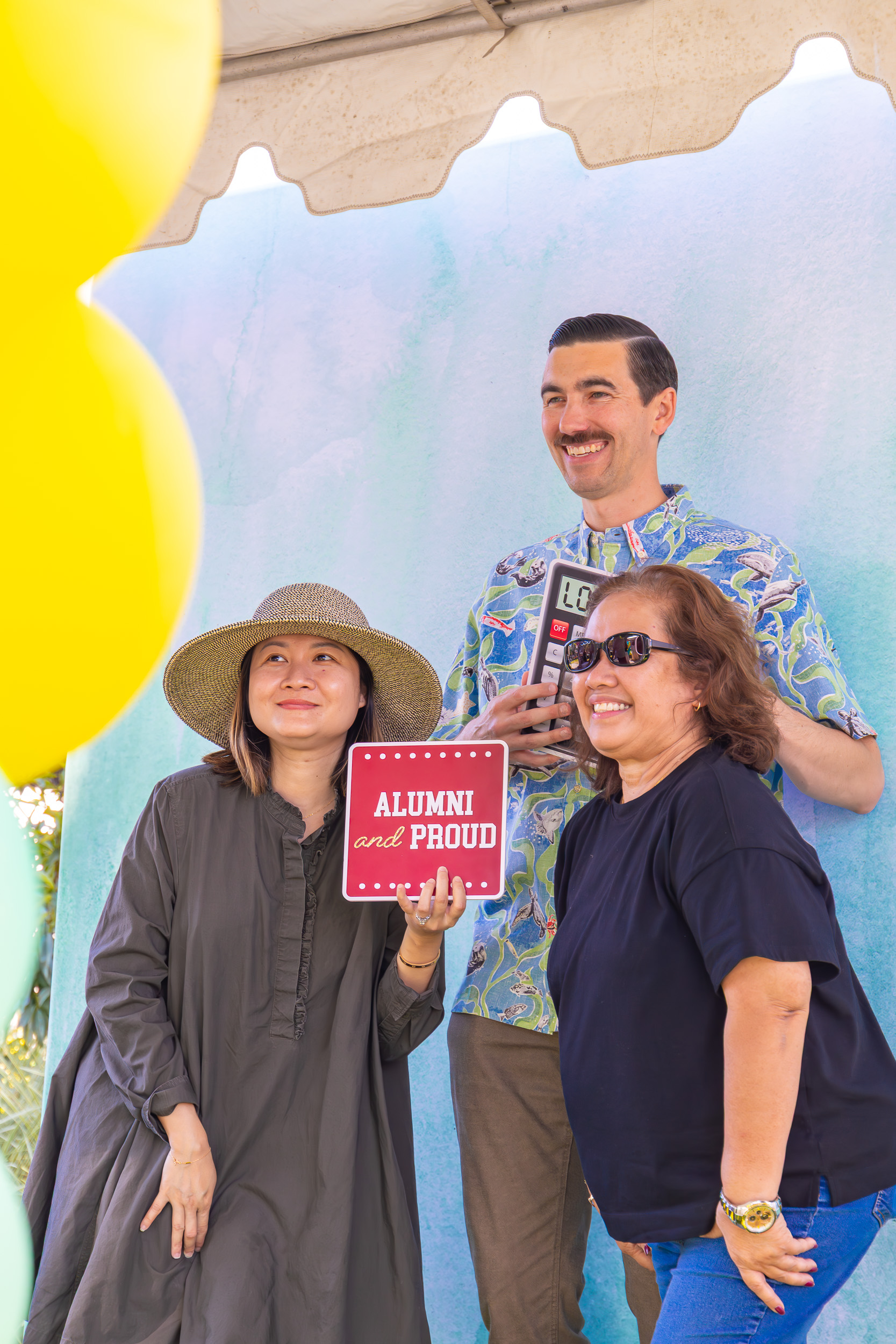 Future U groundbreaking guests smile at a photobooth