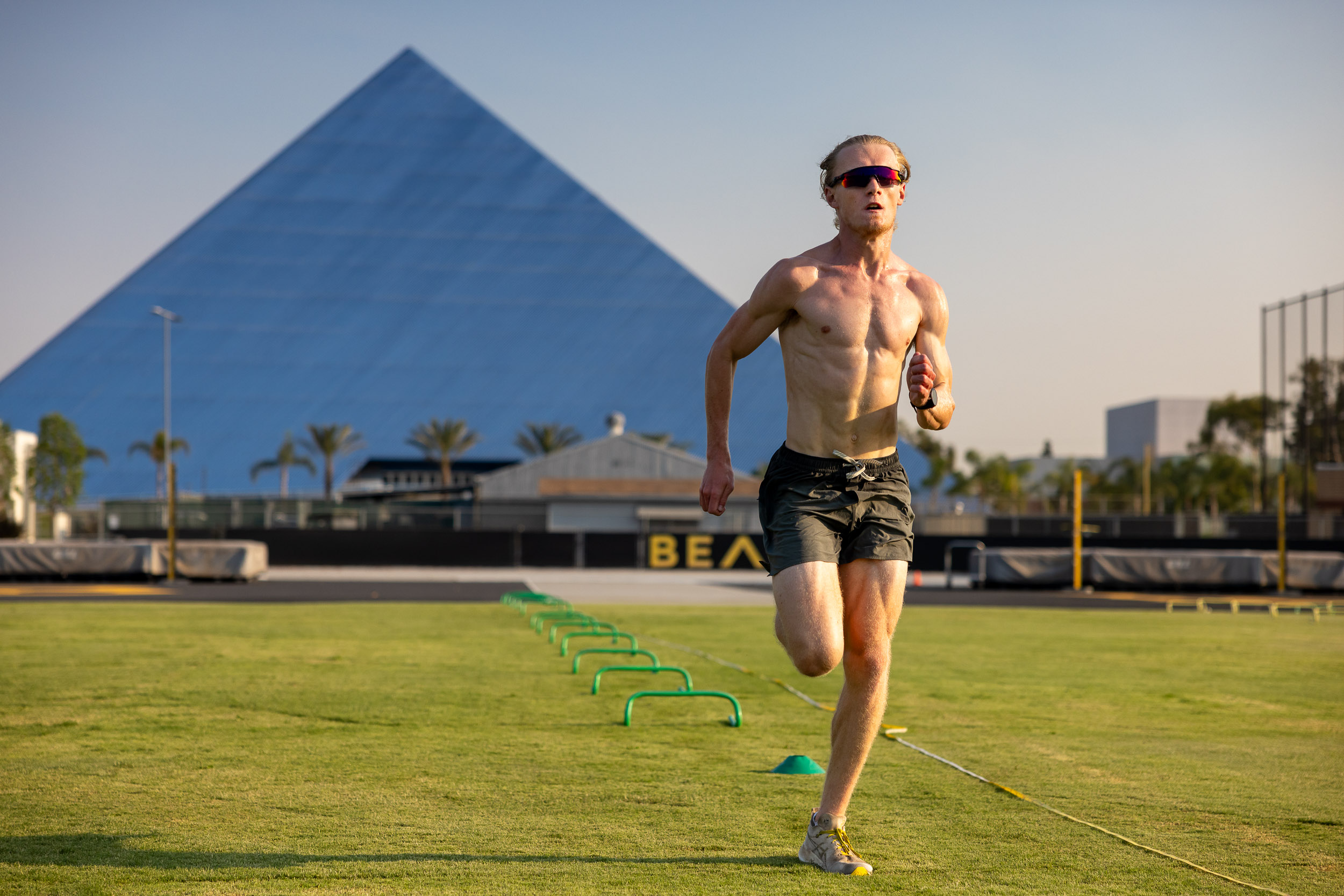 Runner in front of pyramid