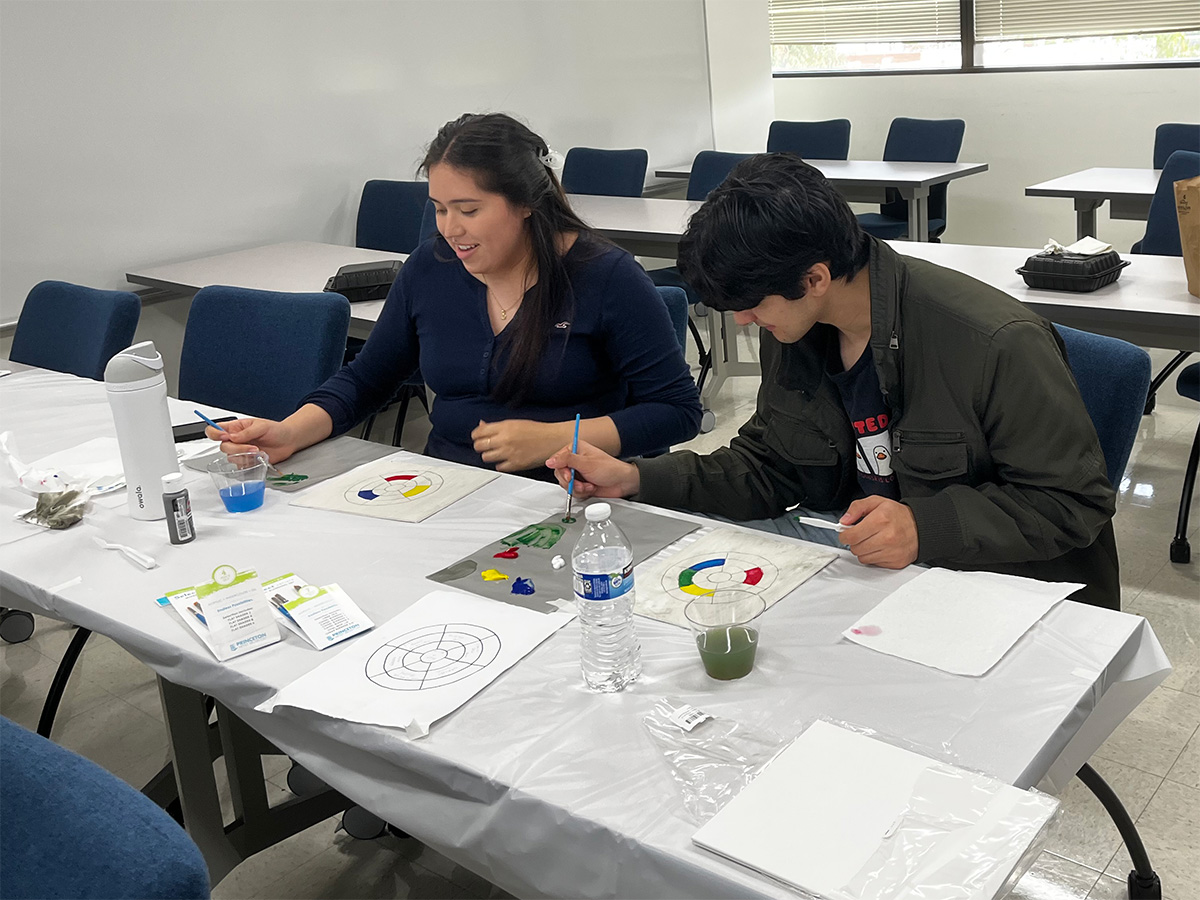 Melanie and Mark mixing colors