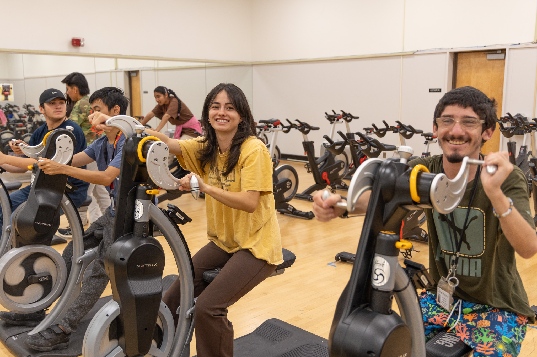 SLP student rides stationary bike