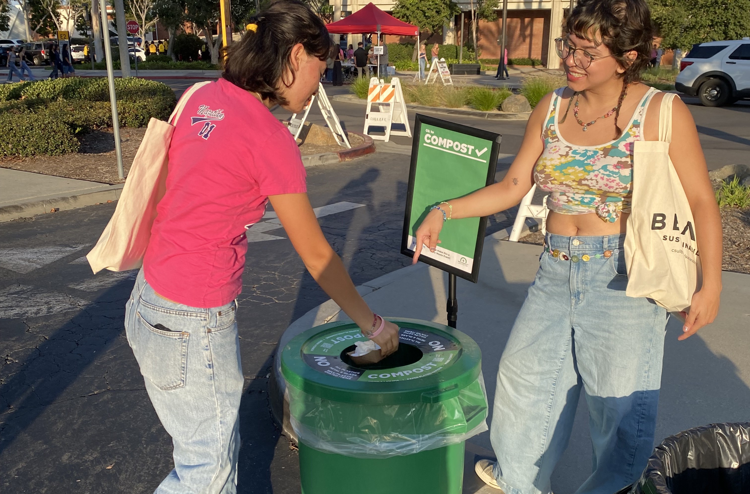 Zero waste ambassador helping someone sort their waste