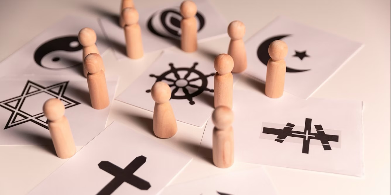 wooden pieces around religious symbols