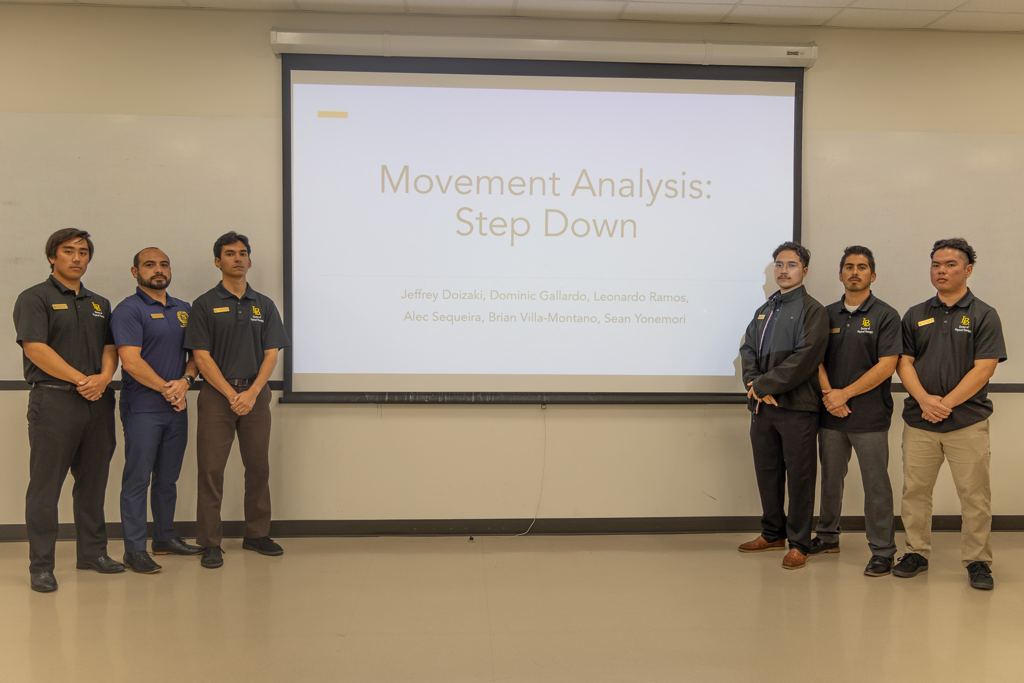 Movement analyis students pose with project