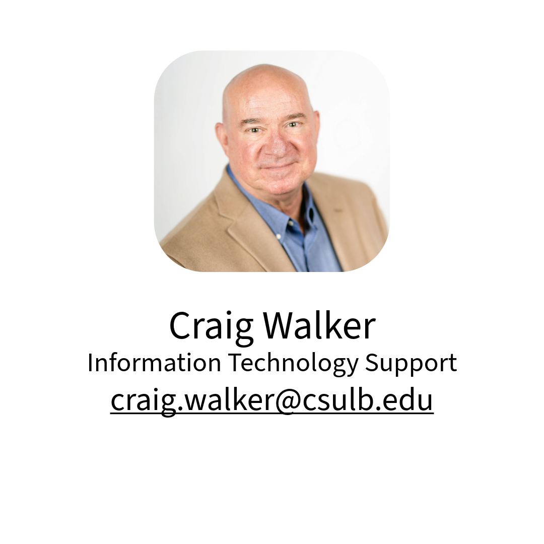 Image of Craig Walker wearing a tan jacket and blue shirt. 