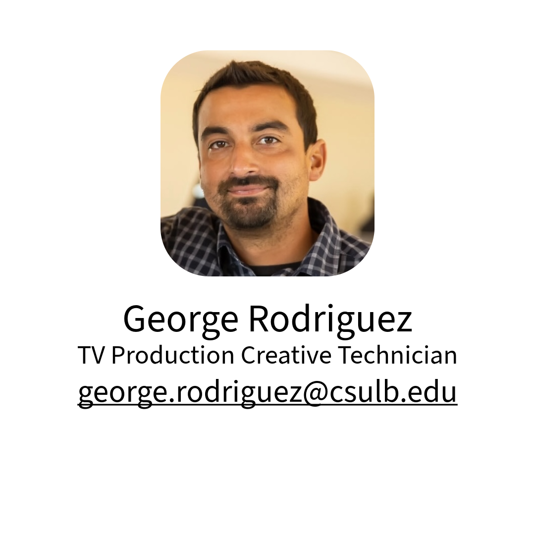 Image of George Rodriguez wearing a black and white plaid shirt.
