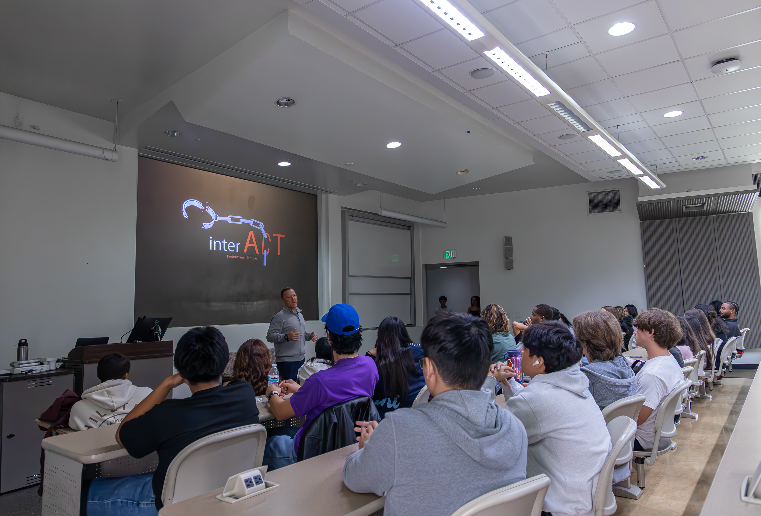 InterACT managing director Kelly Janke speaking to an audience