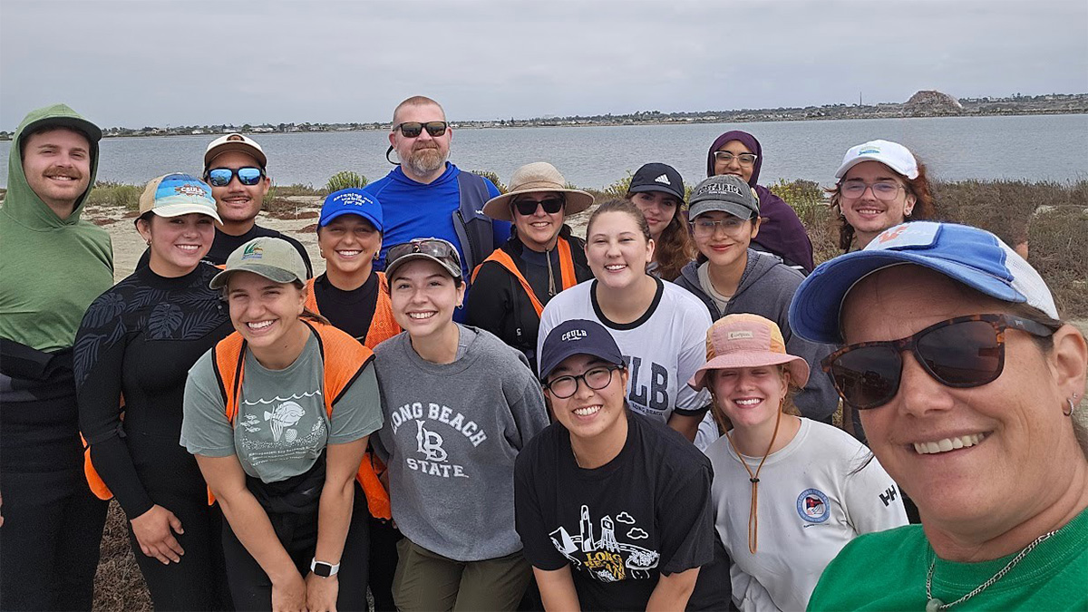 Christine Whitcraft and student researchers in the field