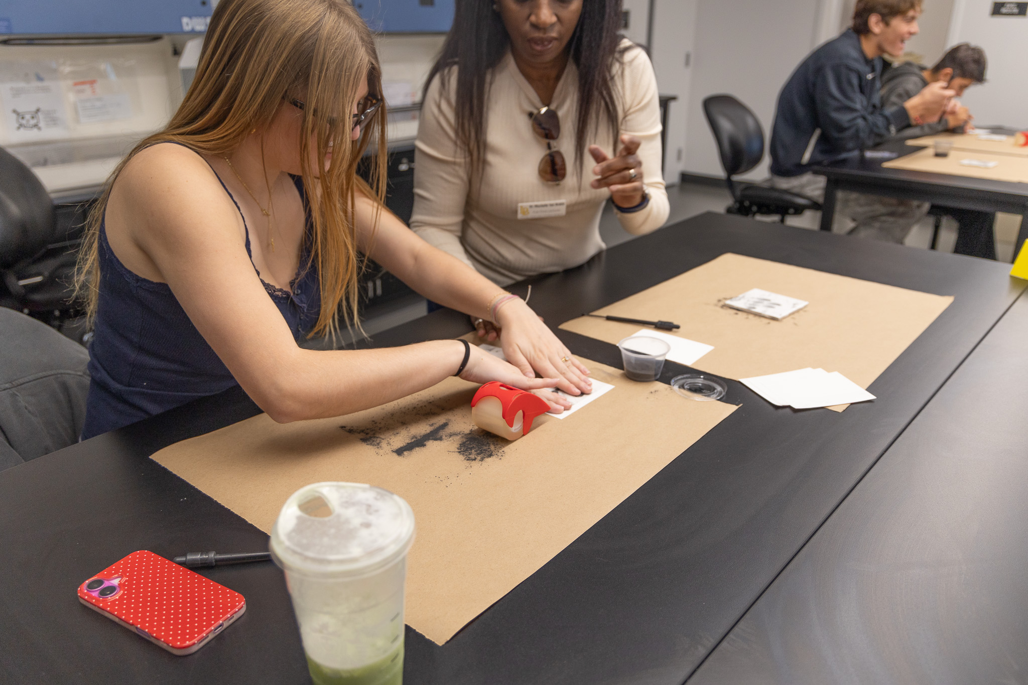 Student works at table