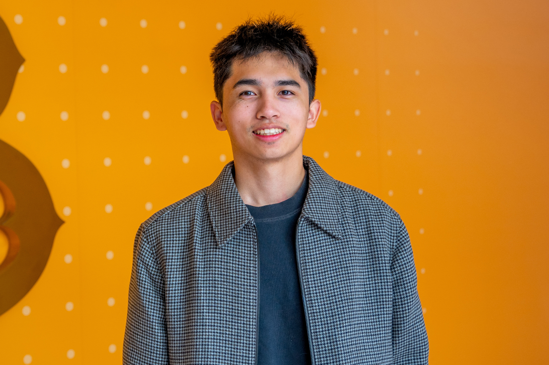 Portrait of Nathan in a blue jacket