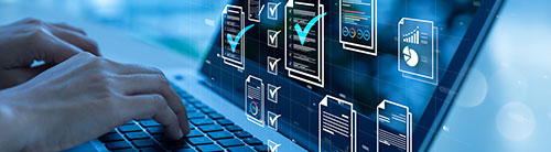 hands on laptop with icons across the screen