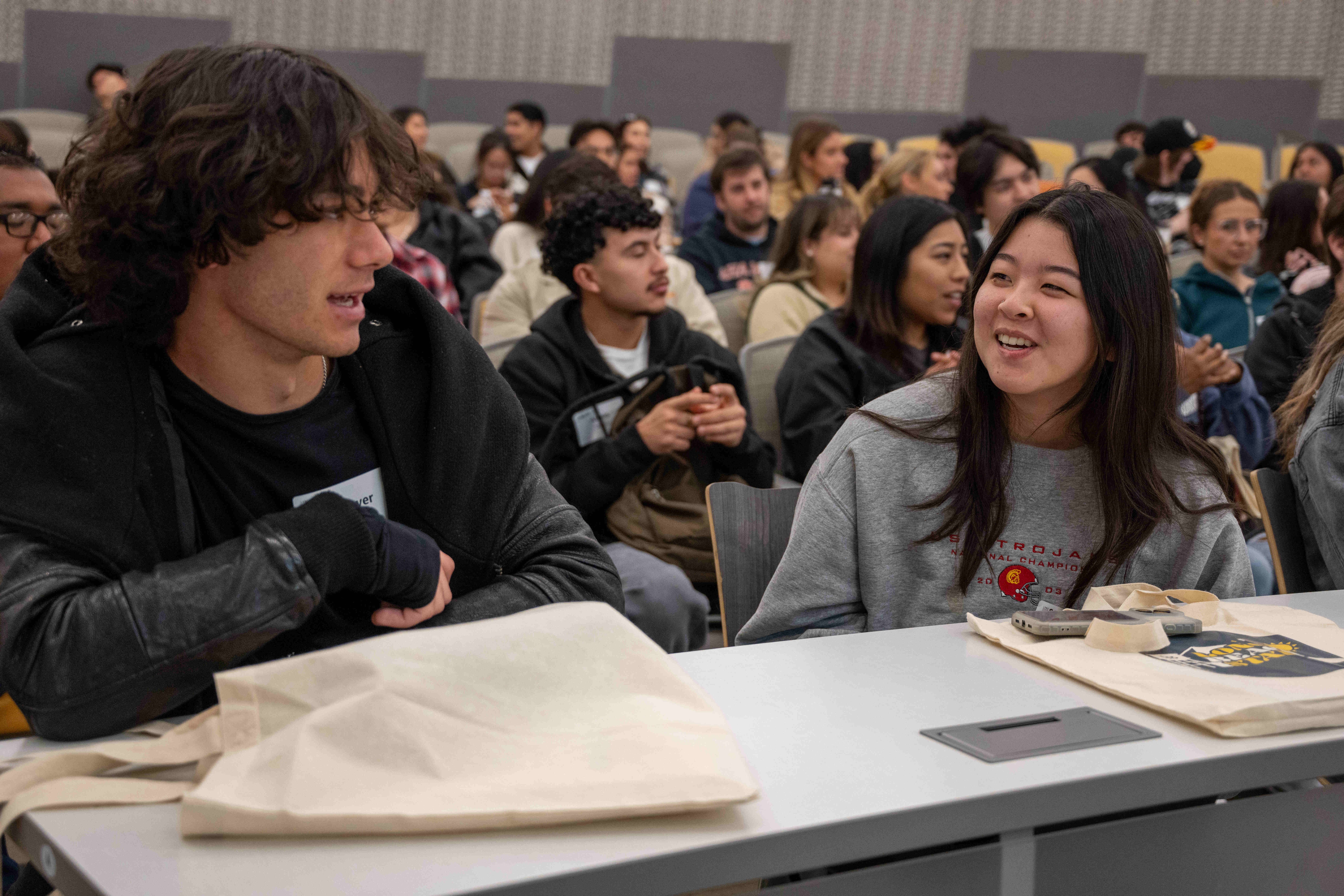 Two students attending SOAR talking together.