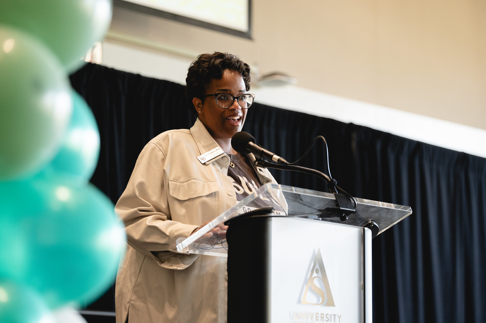 Daria Graham presenting at the 2024 Womxn of Color Leadership Conference.