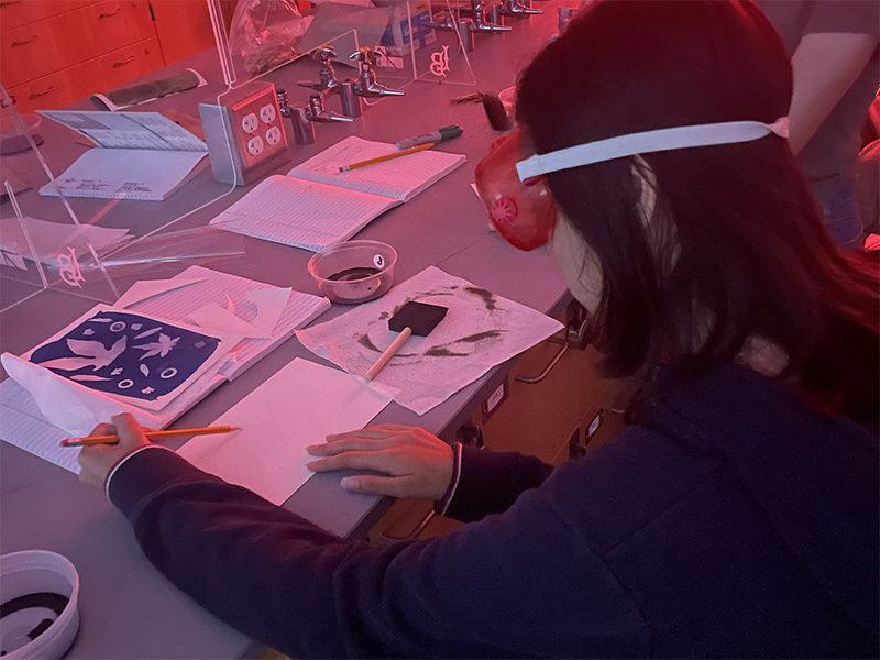 teenager sketching an art concept