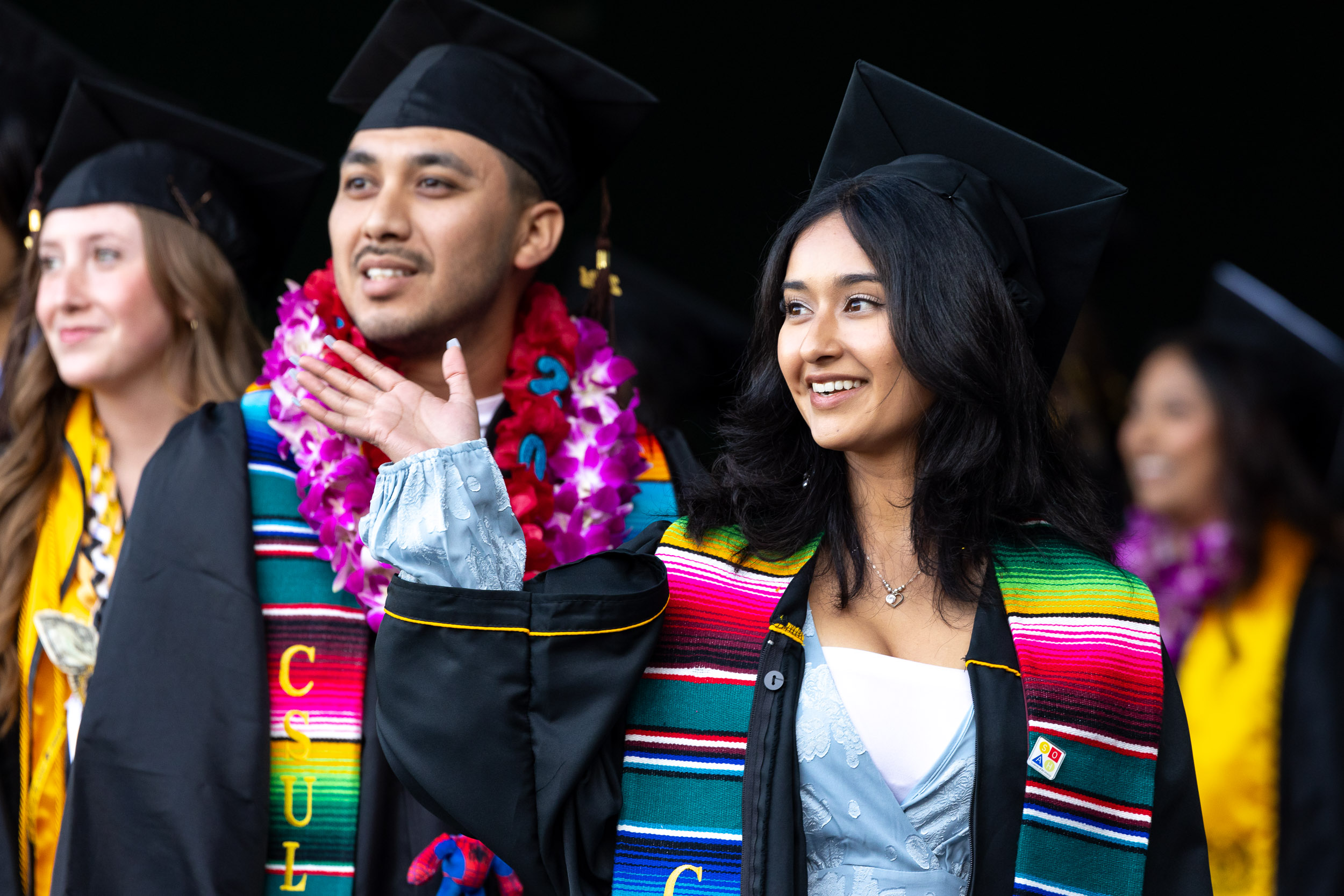 CSULB graduates in a line