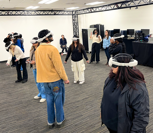 students and teachers wearing vr headsets