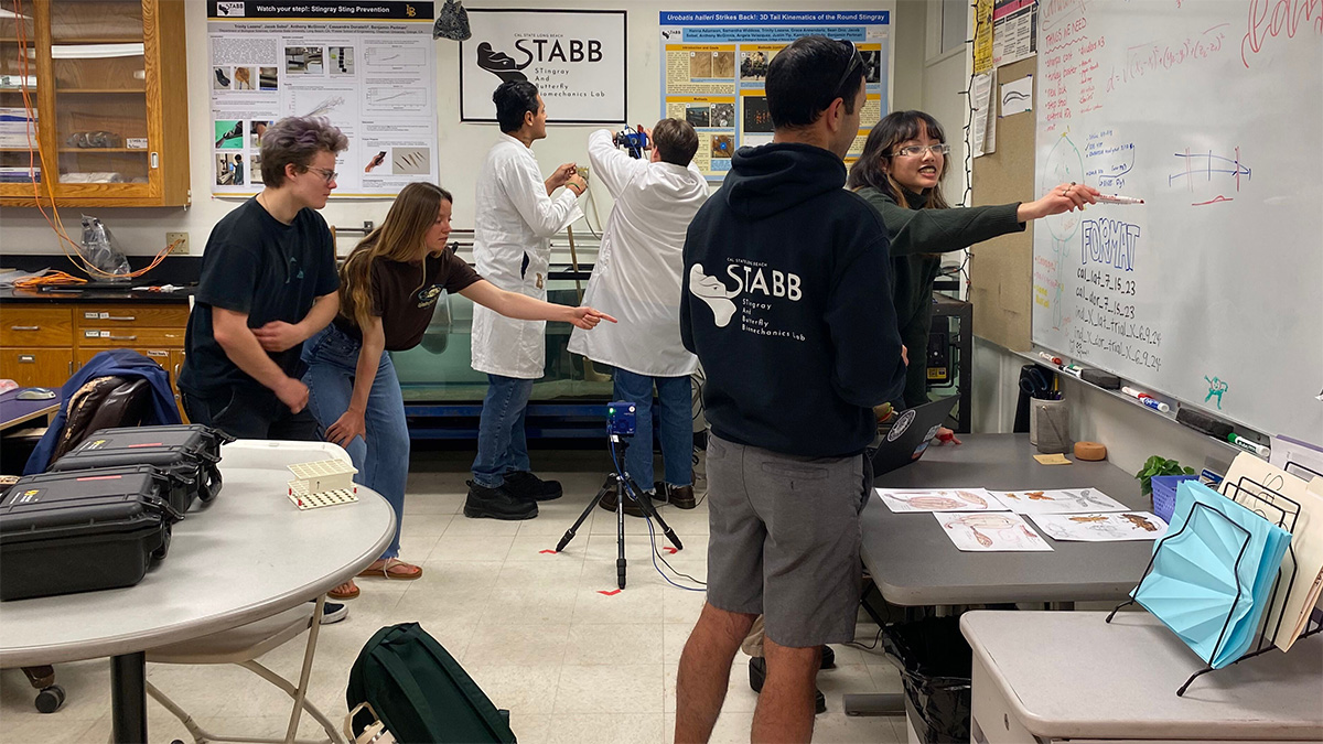 student researchers setting up filming equipment