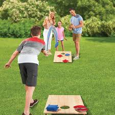 people playing cornhole