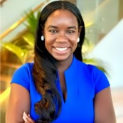 Avis Atkins in blue dress