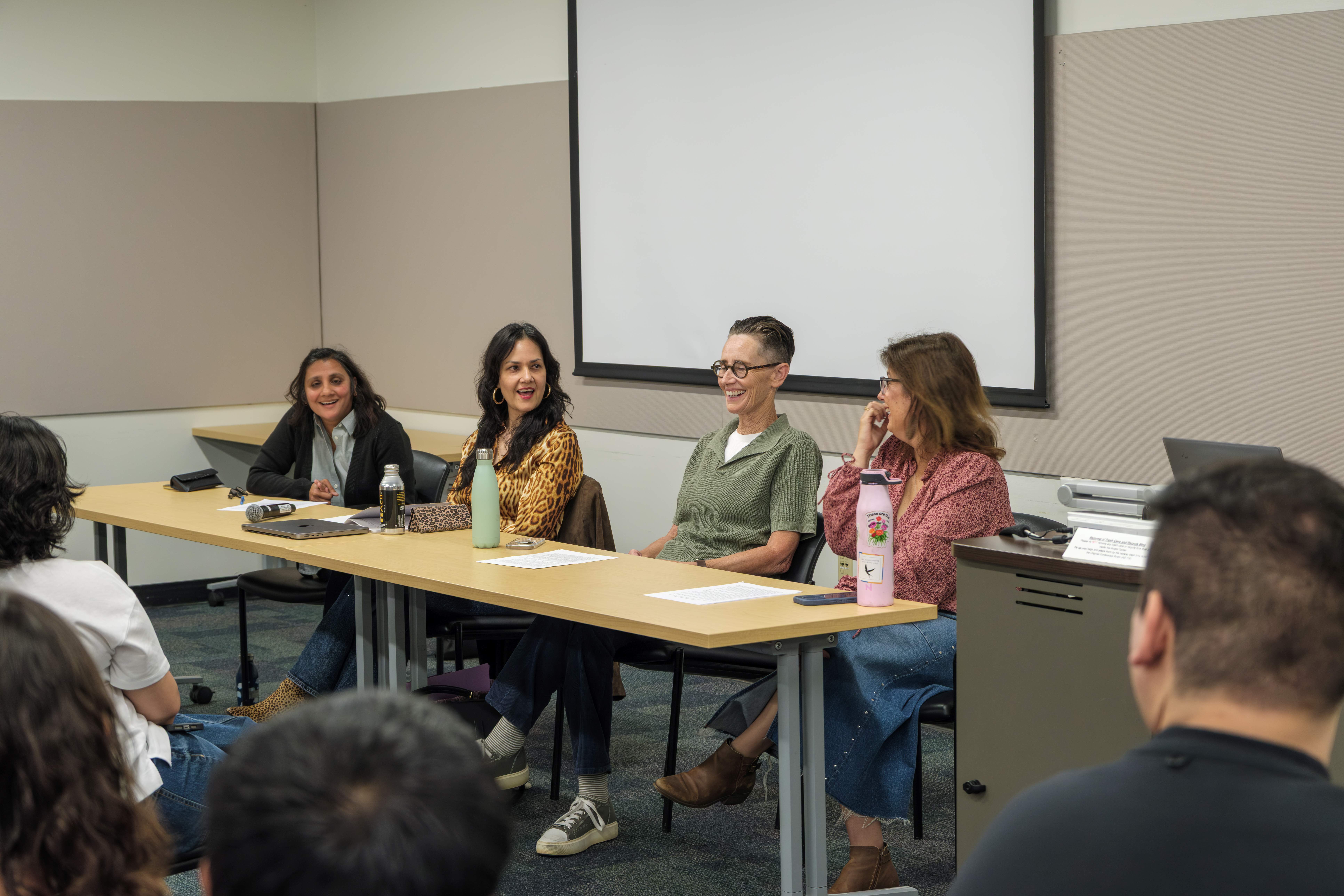 Dr. Reed, Dr. Koshy, Dr. Macias and Dr. Baralt on a panel
