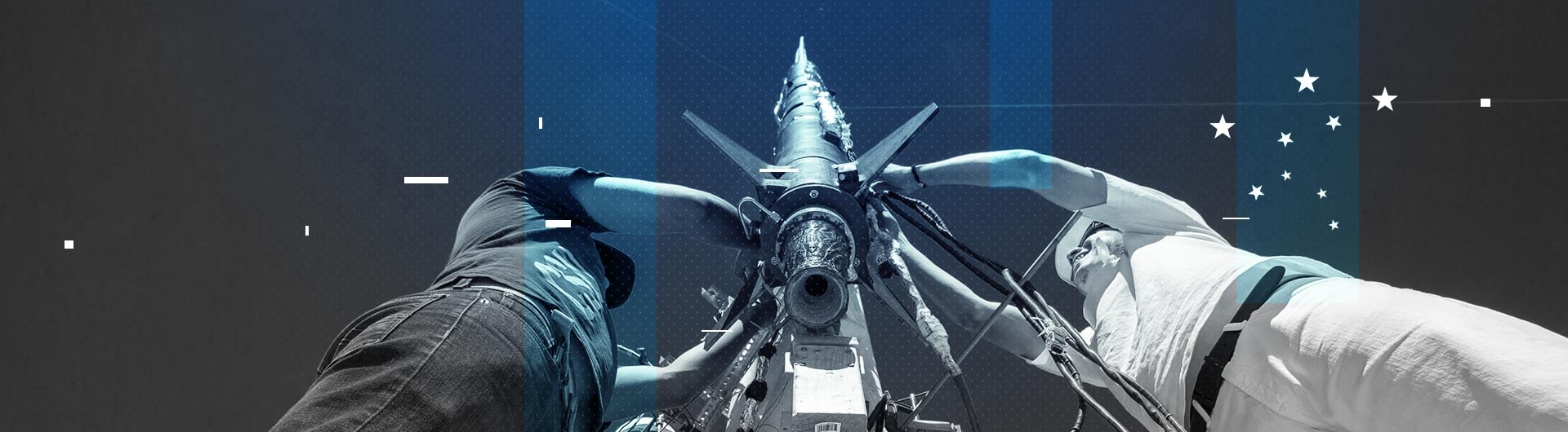 Decorative image of two people with a rocket