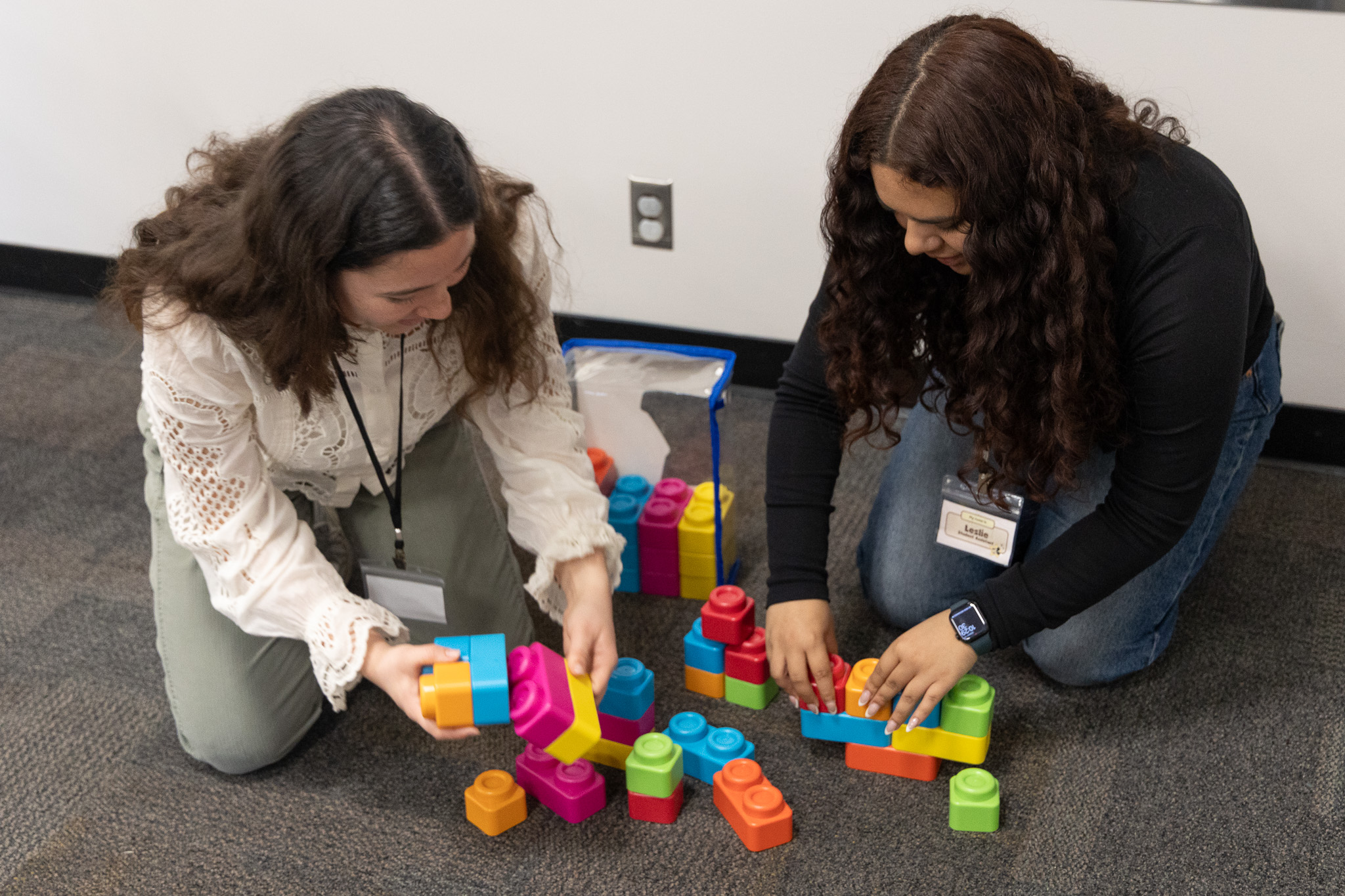 FRC student interns building play set