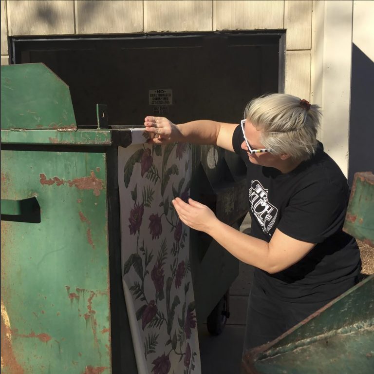 “It’s a way to create a positive or surprising or creative way to ask people to consider where their trash goes.” C. Finely says of her wallpapered dumpsters.