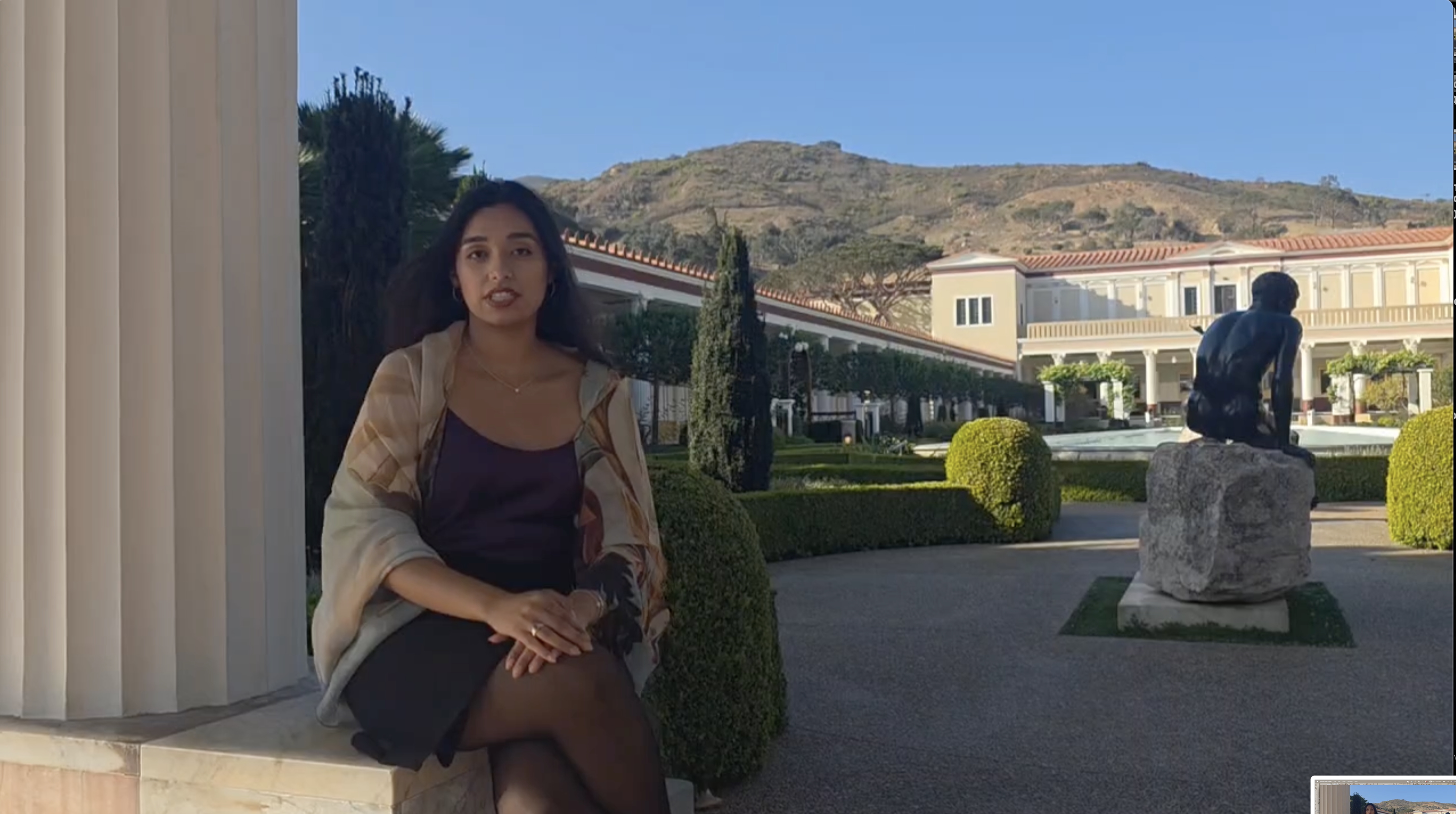 woman sitting in ancient roman villa