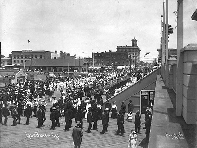 1915 Parade on Pier With Theatorium in Background